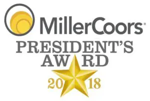 A gold star is on top of the miller coors presidents award logo.