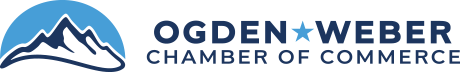 A green background with the words ogden chamber of commerce in blue.